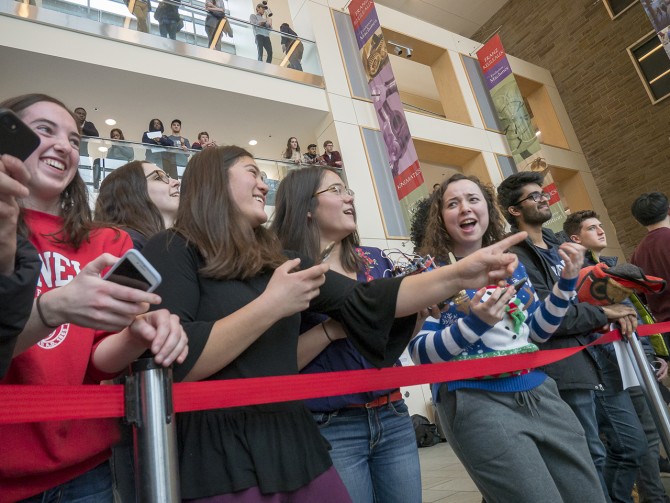 Students gather in the Duffield Hall atrium, and on the nearby balconies, to take in the Mechatronics class "Cube Craze" final competition Dec. 4.
