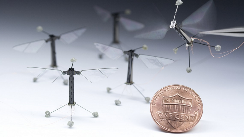 Robobees, with penny included for scale