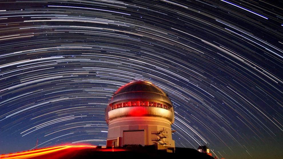 Star trails are pictured over Gemini North, located near Hilo, Hawaii. The observatory will be home to the Gemini Planet Imager, which is being upgraded by a team that includes assistant professor Dmitry Savransky.