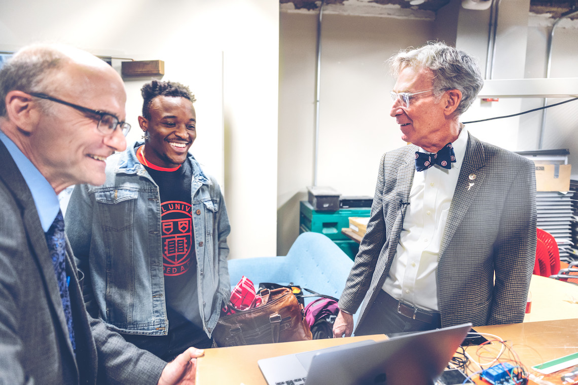 Bill Nye meets with professor and student