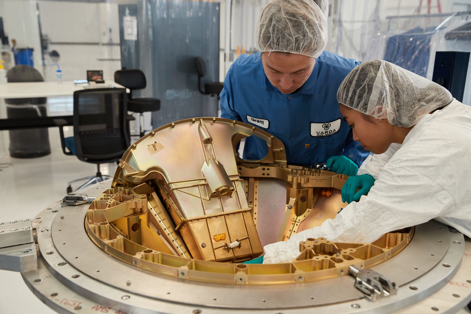 Varda employees integrate one of Varda’s first spacecraft.